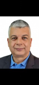 TOM COELHO